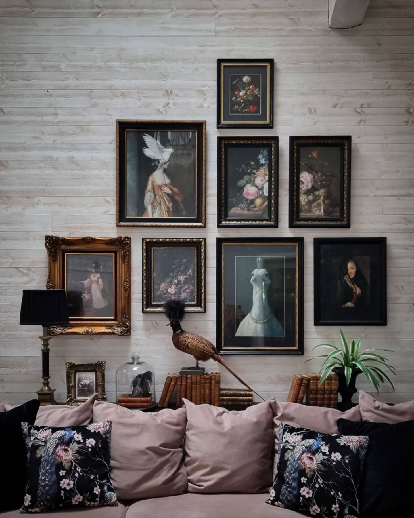 28. Vibrant Geometric Vases and Macrame Fusion Above a Mid-century Sofa