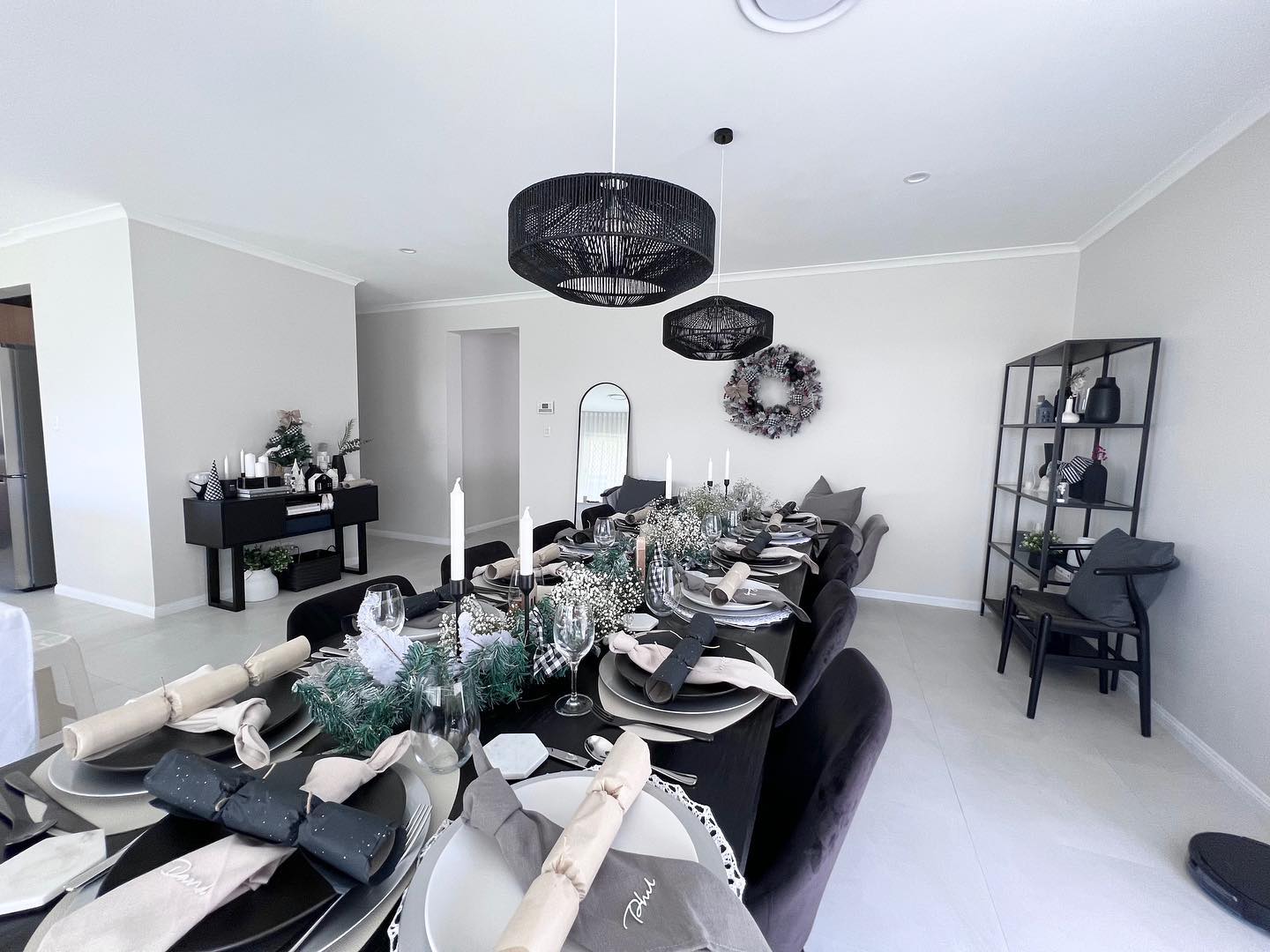 8. Snowflake Ornaments Dangling from Ribbon In Black and White Elegance