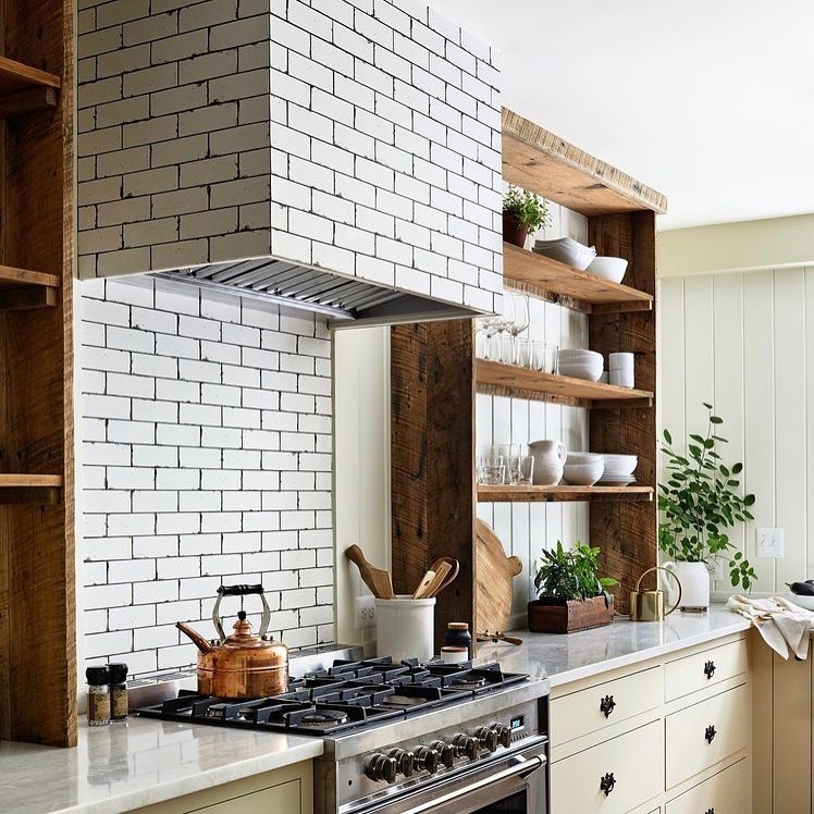 37. the Fusion Of Industrial Steel and Warm Wood In a Compact Kitchen Space