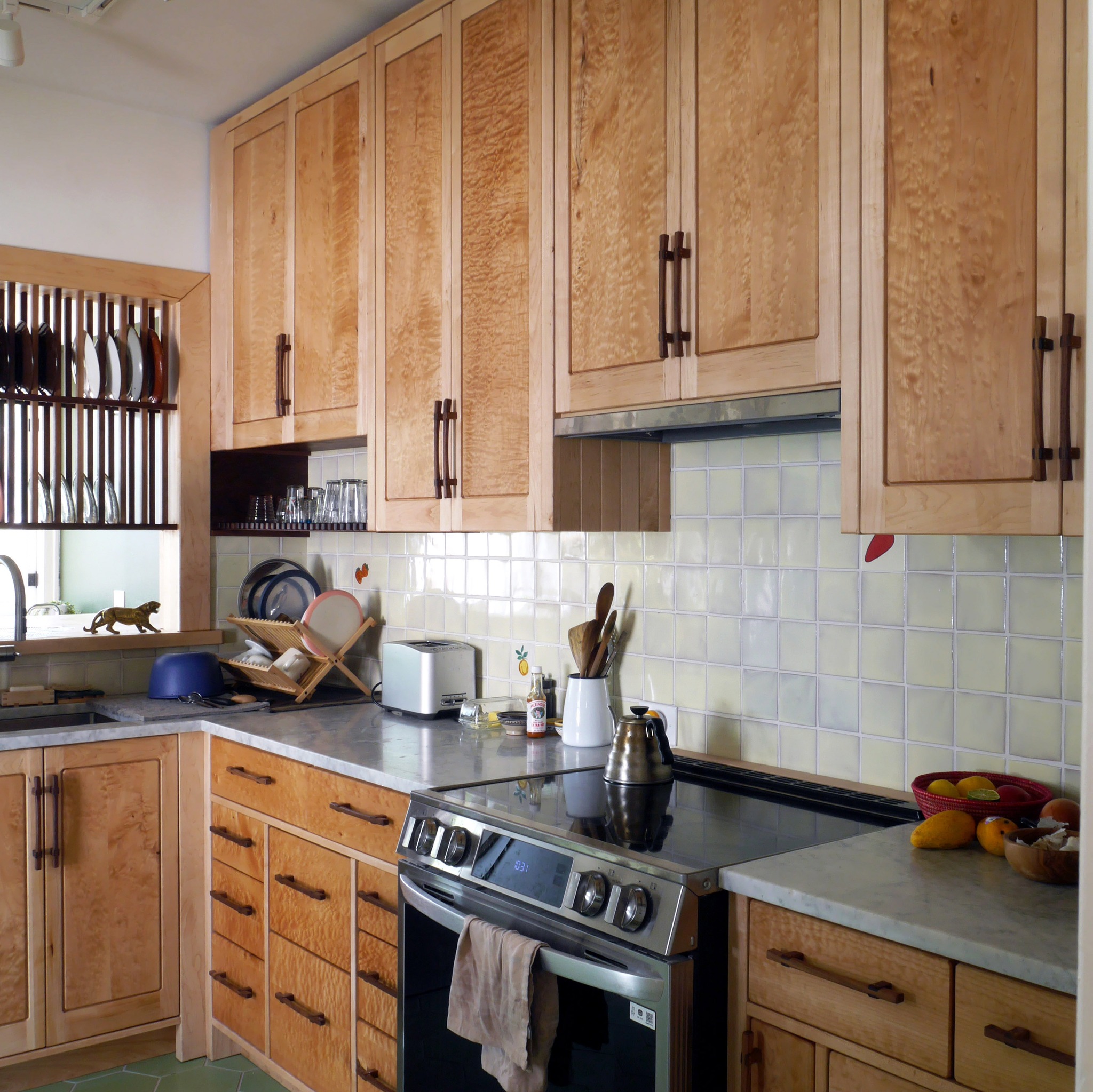 8. Moonlit Quartz Countertops and Midnight Shaker Doors: a Kitchen's Dreamscape