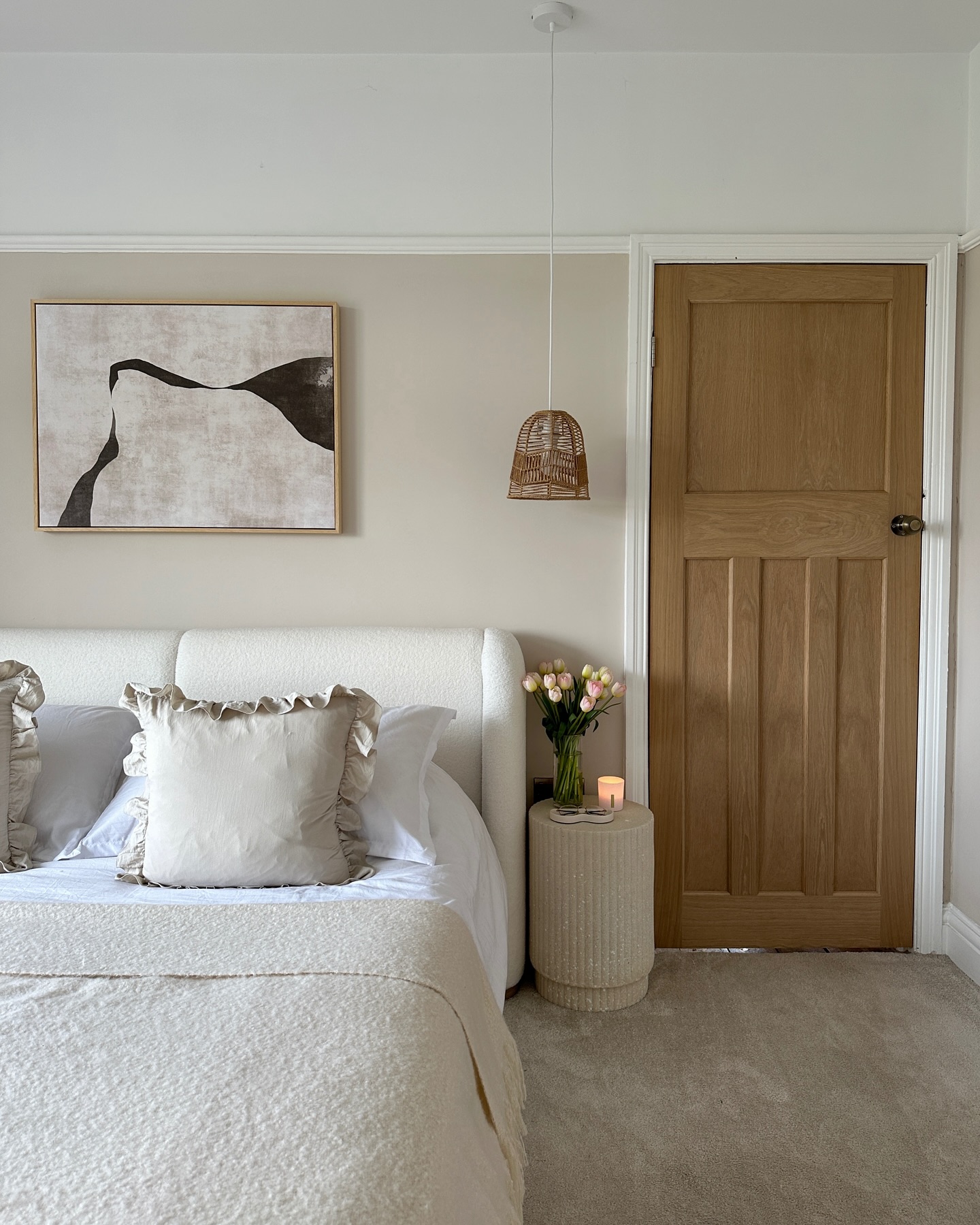 33. Soft Blush Accents and Geometric Quilt Patterns In a Neutral Haven