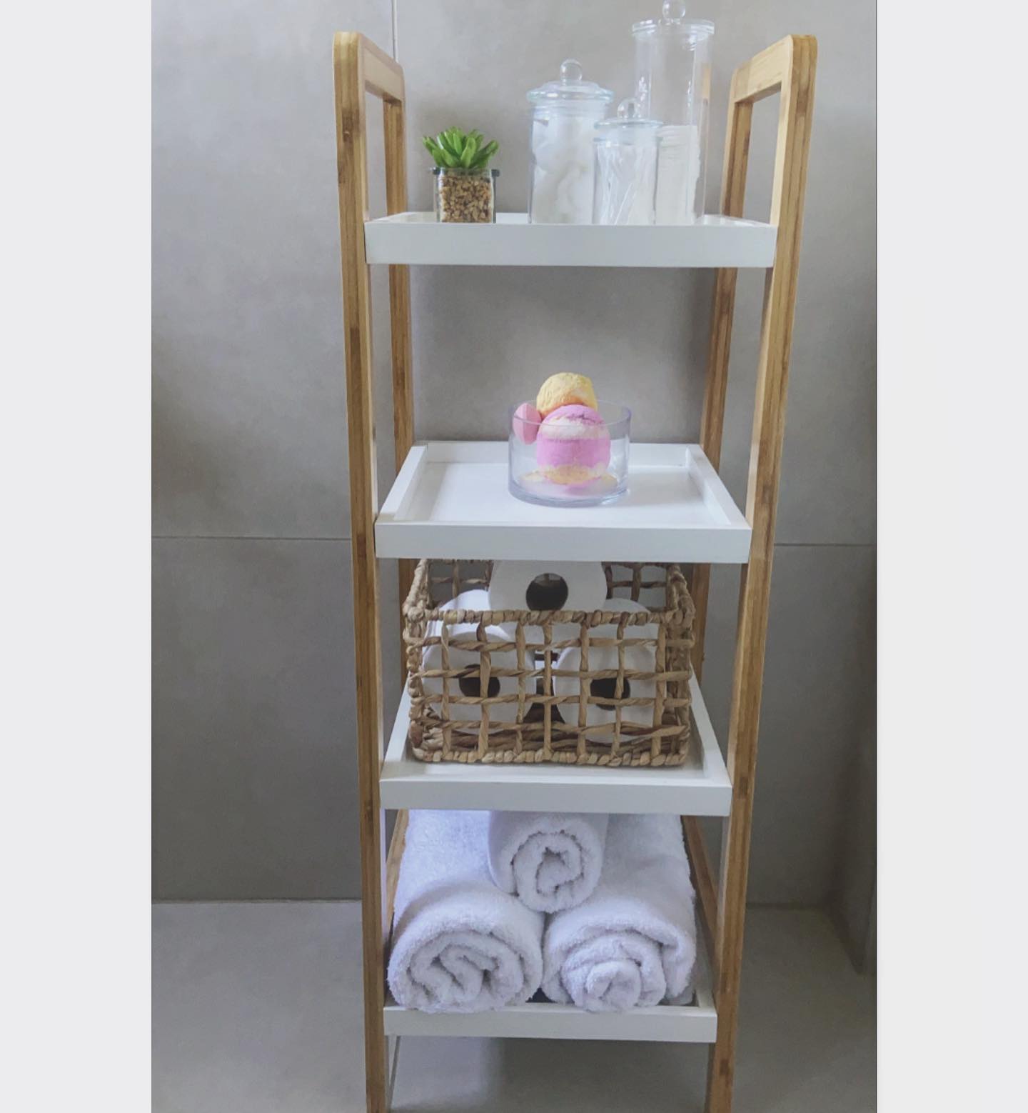6. Overhead Industrial Pipe Shelving with Vintage Brass Fixtures