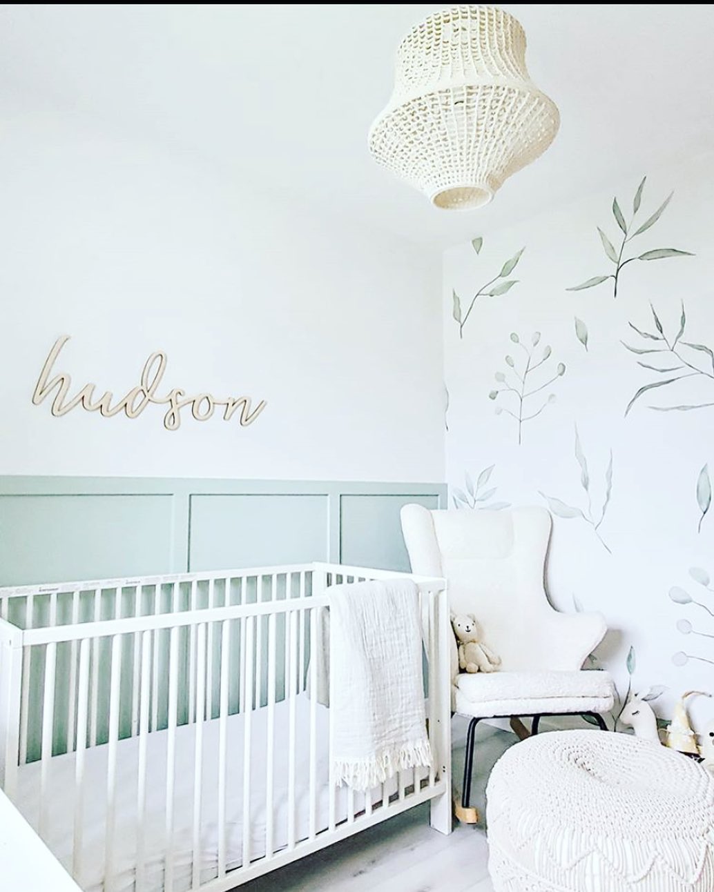 30. Soft Lavender Clouds Hover Over Geometric Wooden Cradle