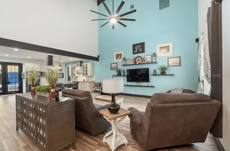 3. a Symphony Of Teal and Wood: the Geometric Accent Wall Living Room