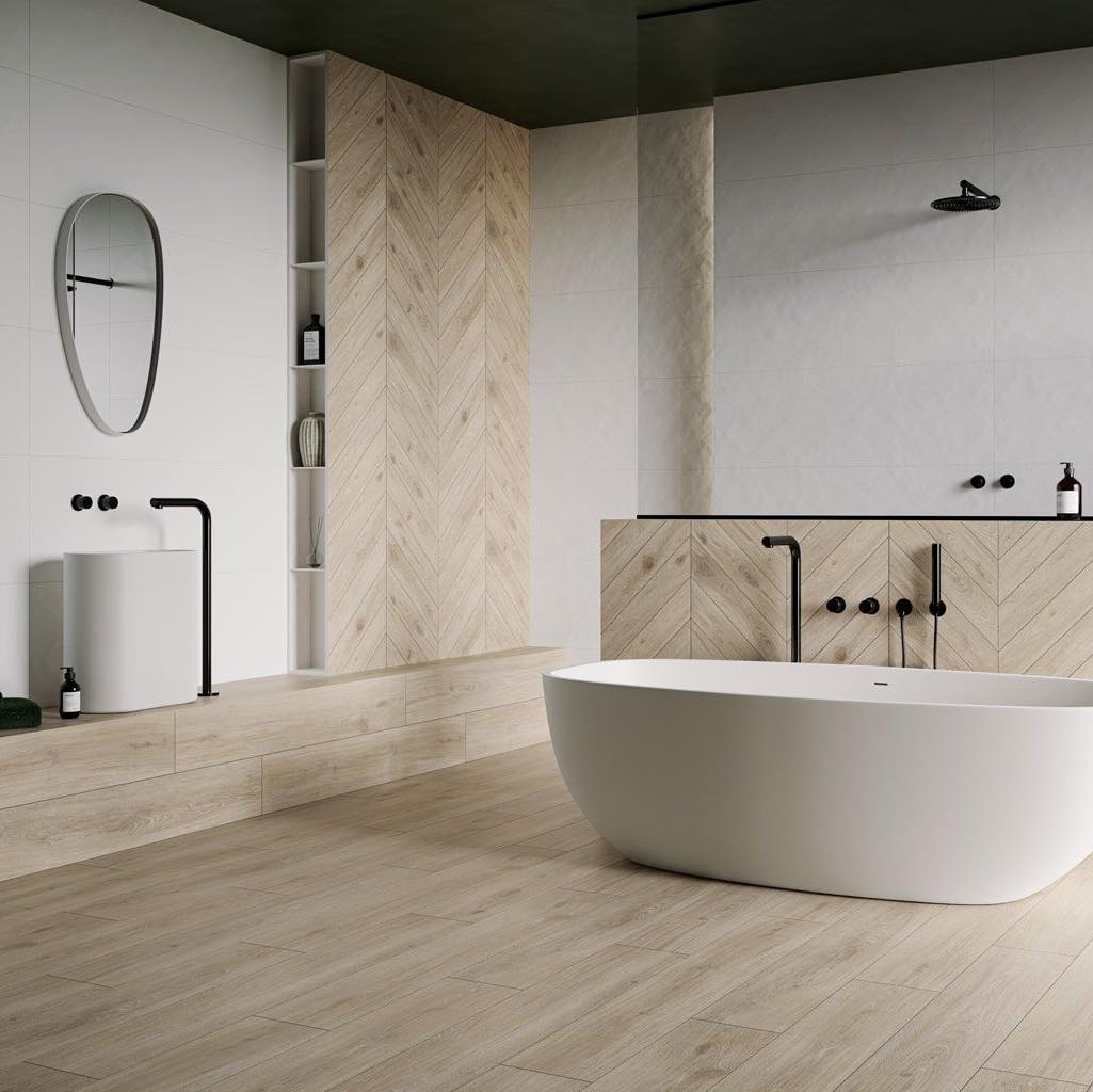 2. a Marble Mosaic Floor and Gold-framed Mirror In a Softly Lit Bathroom