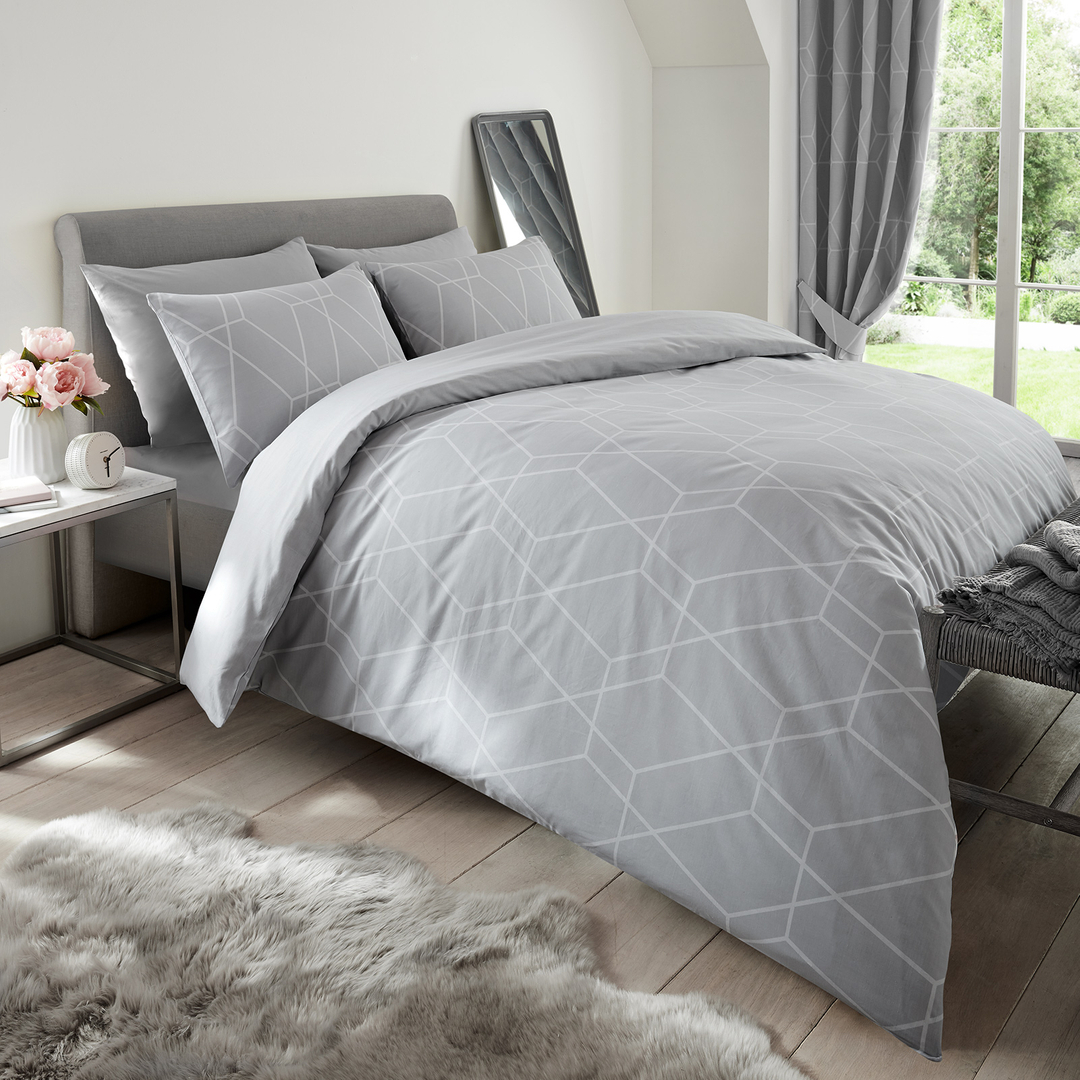 14. Moonlit Whisper Bedding with Geometric Wall Accents In a Grey Haven