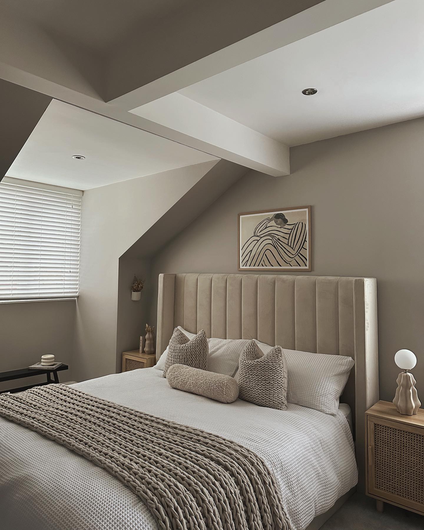31. Soft Whisper Of Taupe: a Bedside Lamp's Glow on Linen Layers