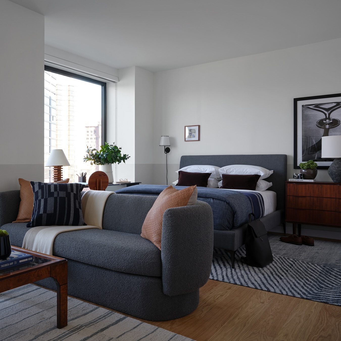 14. Tiny Urban Oasis: a Loft Bed Over a Cozy Nook with a Pop Of Yellow