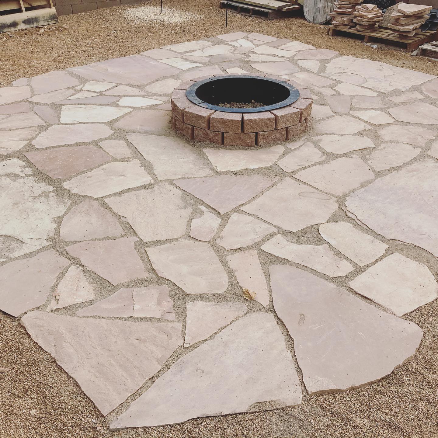 1. the Mossy Embrace: a Flagstone Patio Where Nature Meets Comfort