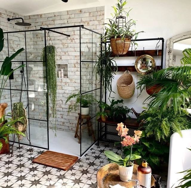 26. Bohemian Rhapsody In Tiles: Vintage Blue and White Mosaic with Hanging Plants