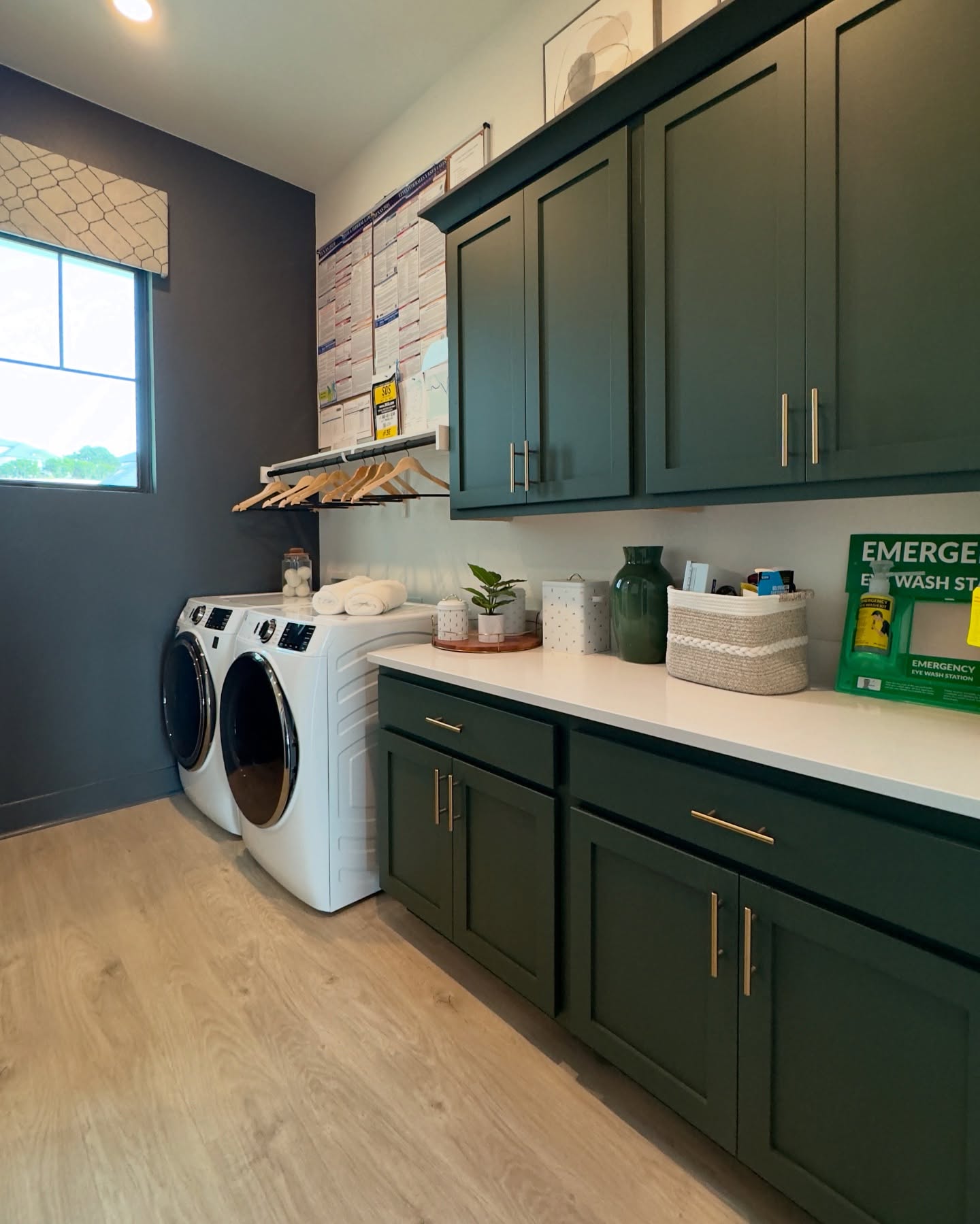 15. the Interlocking Chevron Patterned Cabinet with Brass Hardware and Subway Tile Backsplash