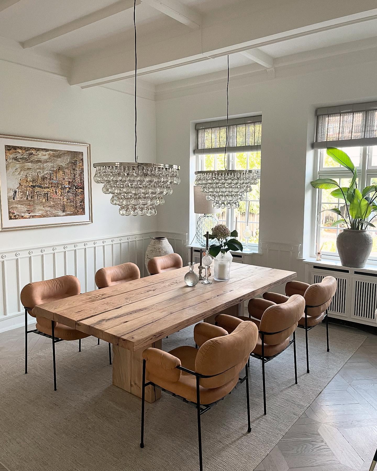 26. Mid-century Modern Dining Table with Hourglass Legs and Amber Glow Top