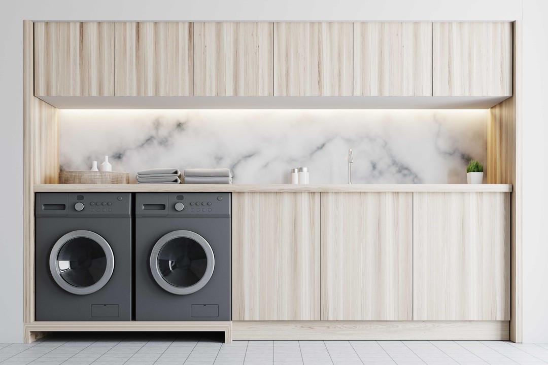 3. Geometric Harmony In White: the Triangular Pegboard Laundry Room Cabinet