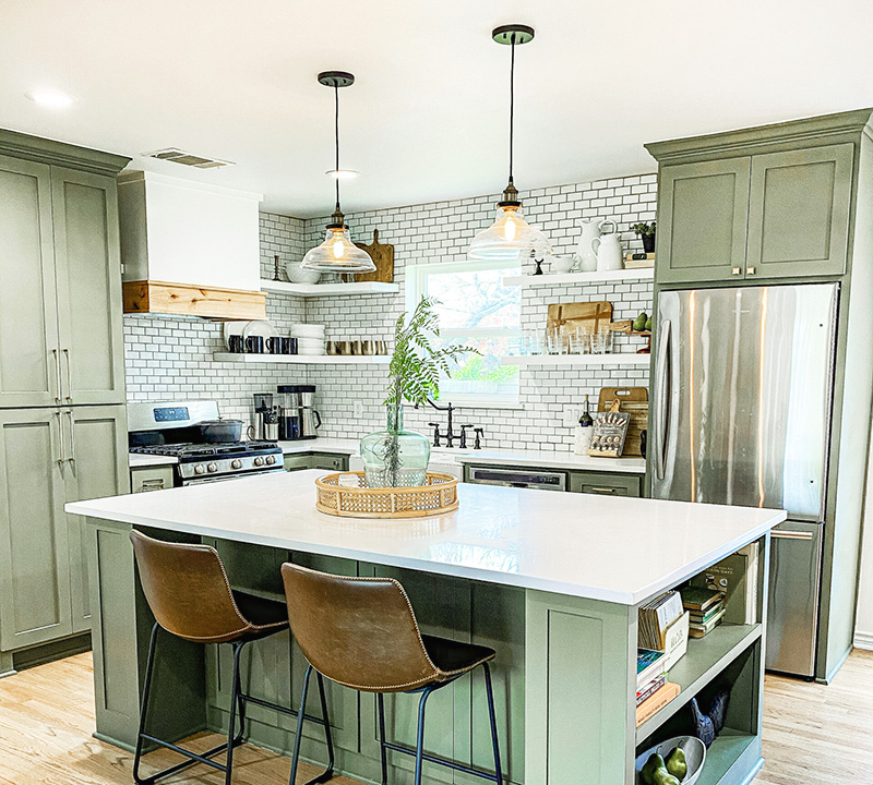 10. Sunlit Serenity: Pale Blue Shaker Cabinets with Brass Accents and Open Shelving