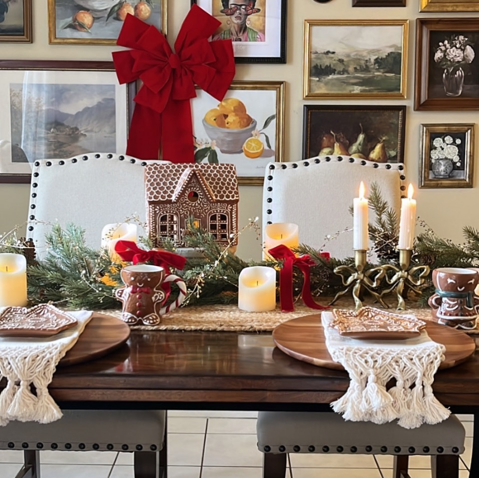 23. Crimson Ribbons and Golden Glow: a Festive Table Setting with Pine Cones and Candles