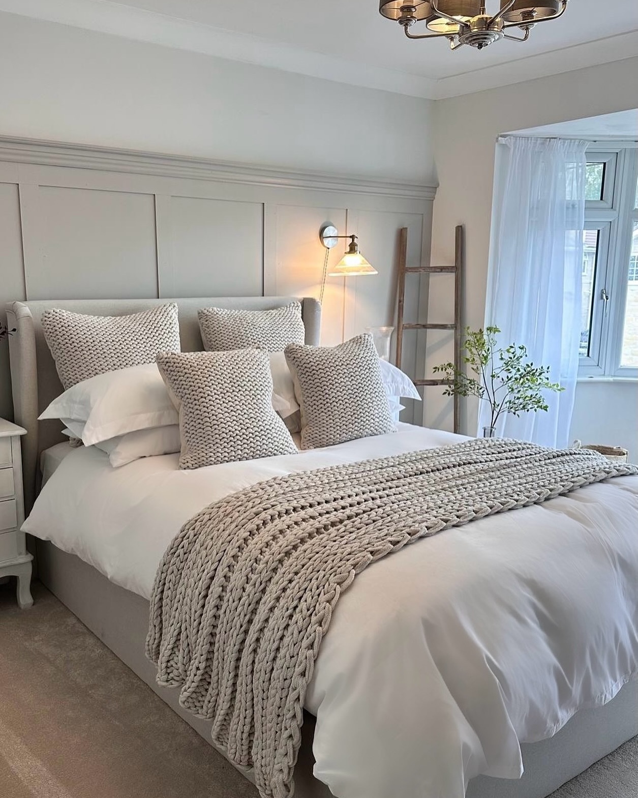 11. Sunlit Serenity: a Bedroom with a Gabled Ceiling and Cozy Nook