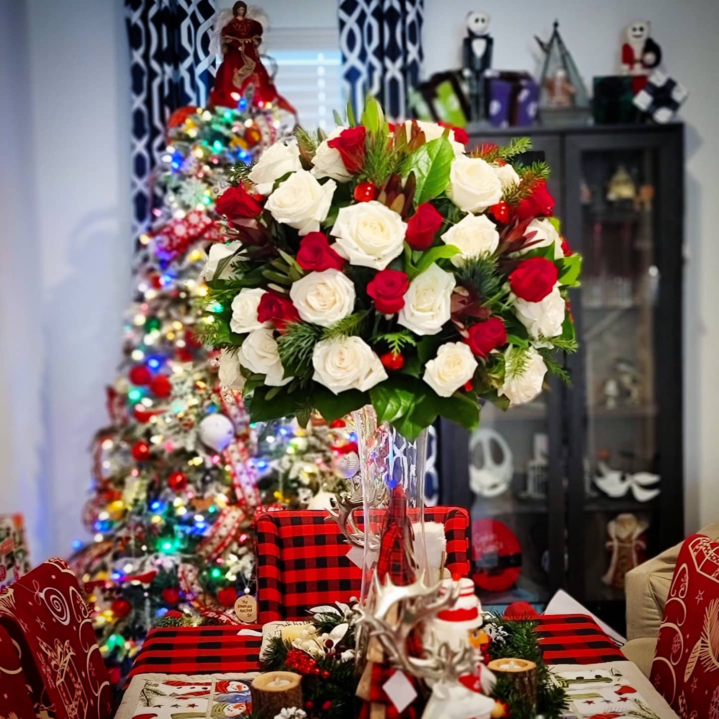 16. Crimson Ribbons and Snowy Pines: a Festive Wreath with a Rustic Twist