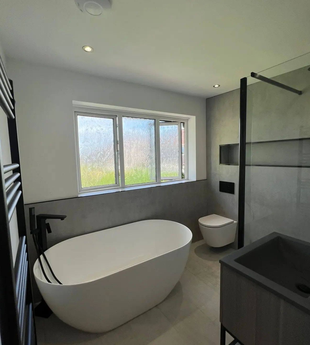25. Tiled Waves and Wooden Accents: a Coastal Retreat with a Floating Sink