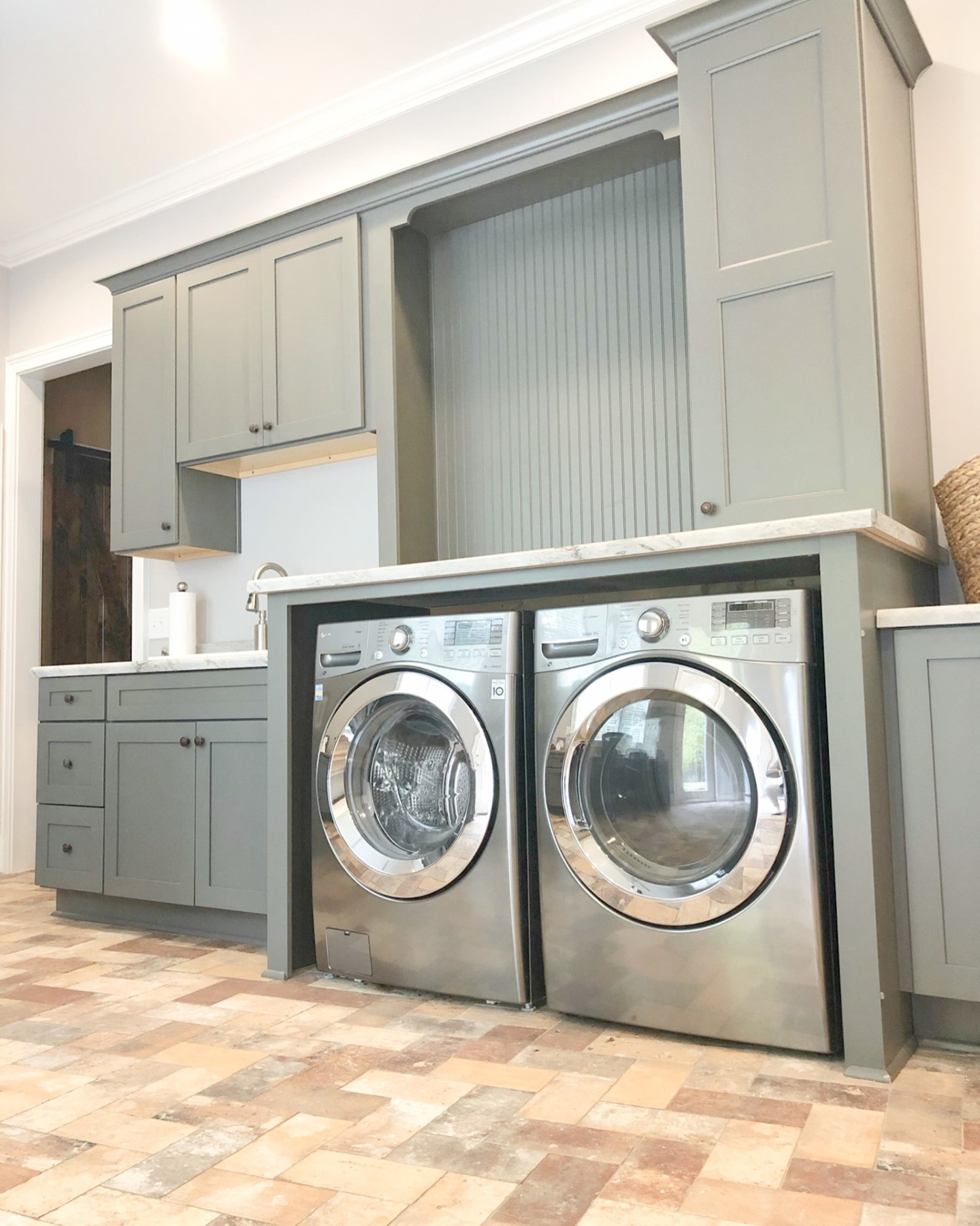 16. the Whimsical Blue Hutch with Copper Accents and Woven Baskets