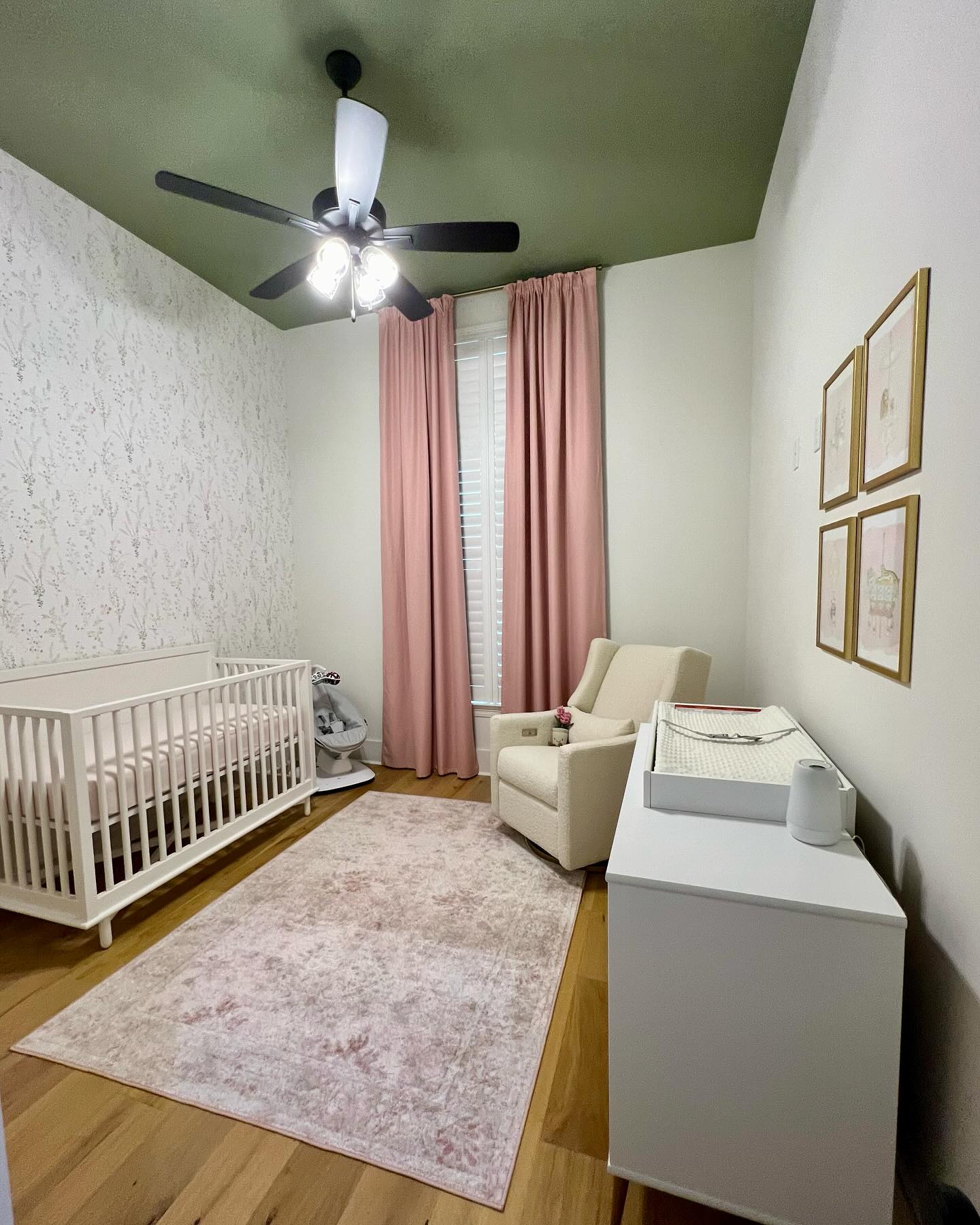 7. Sage Green Crib with Whimsical Cloud Mobile and Plush Woodland Friends