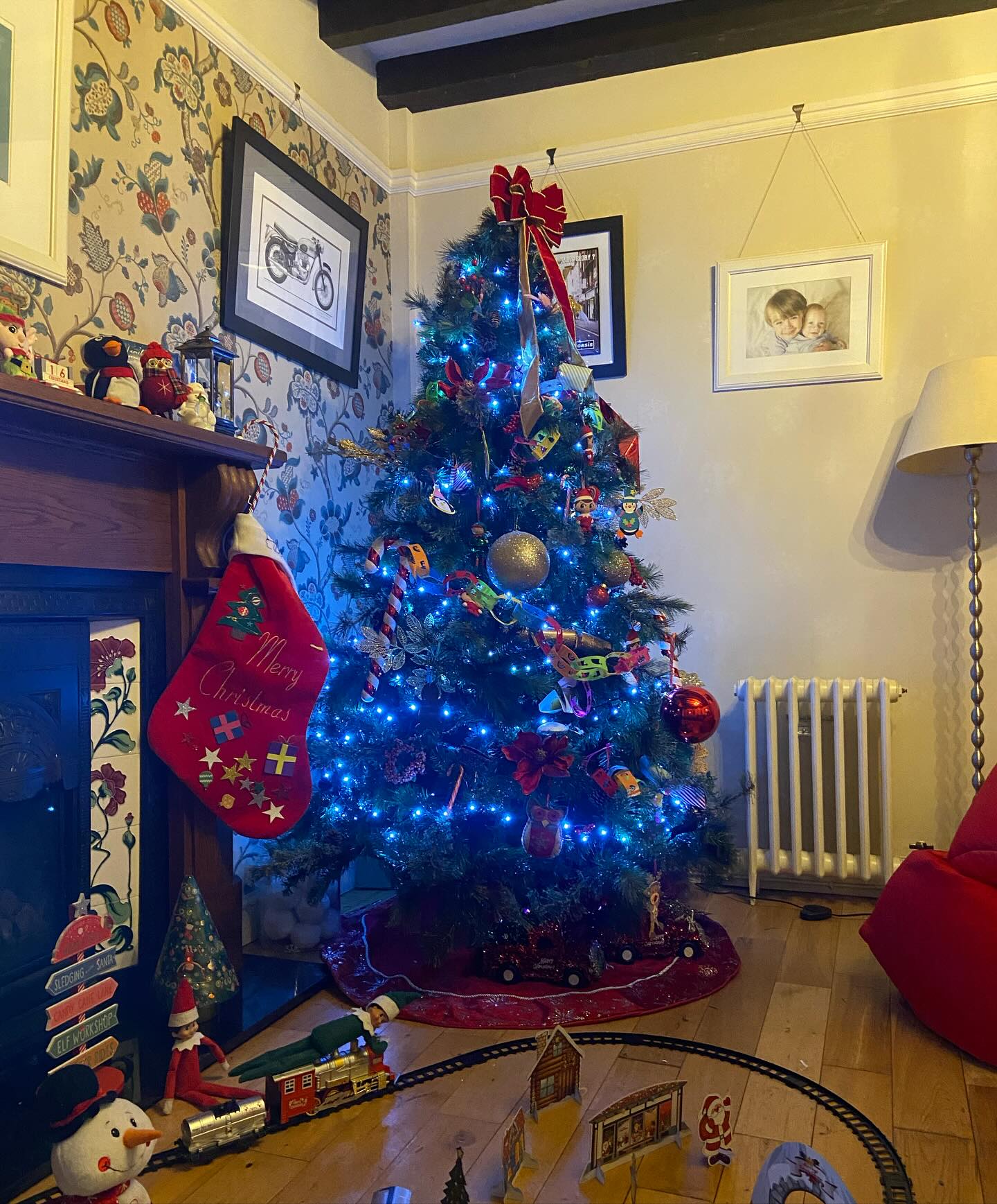 16. Frosted Pine Cones and Silver Ribbons Adorn a Blue Bauble Wonderland