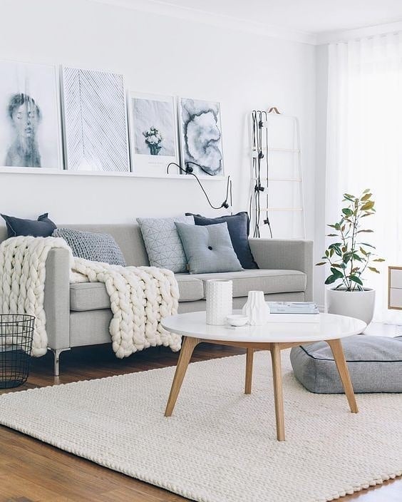 2. Cozy Nook with a Suspended Orb and Vintage Bookshelf