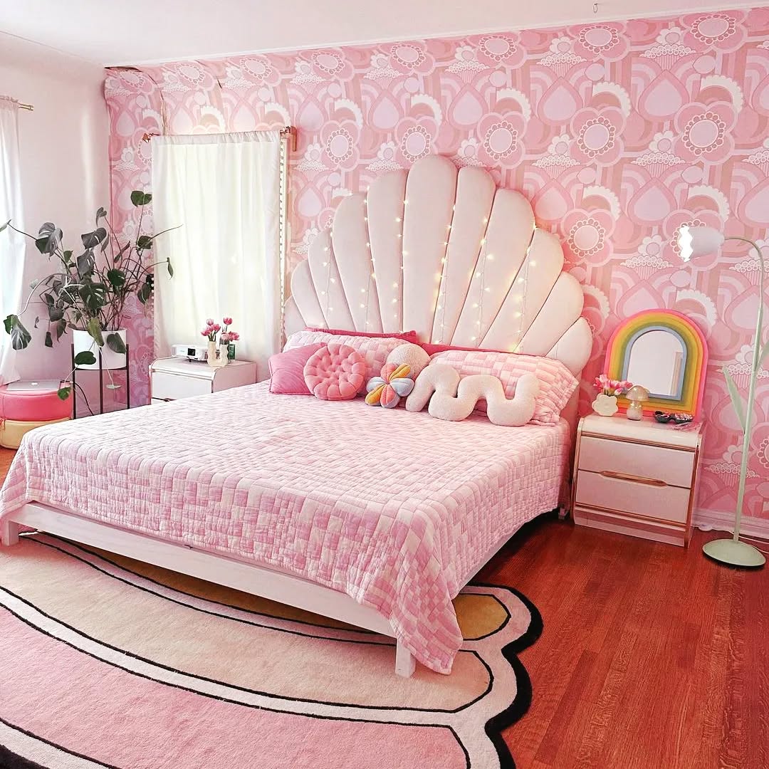 52. Whimsical Pink Canopy Bed with Polka Dot Accents and Vintage Charm