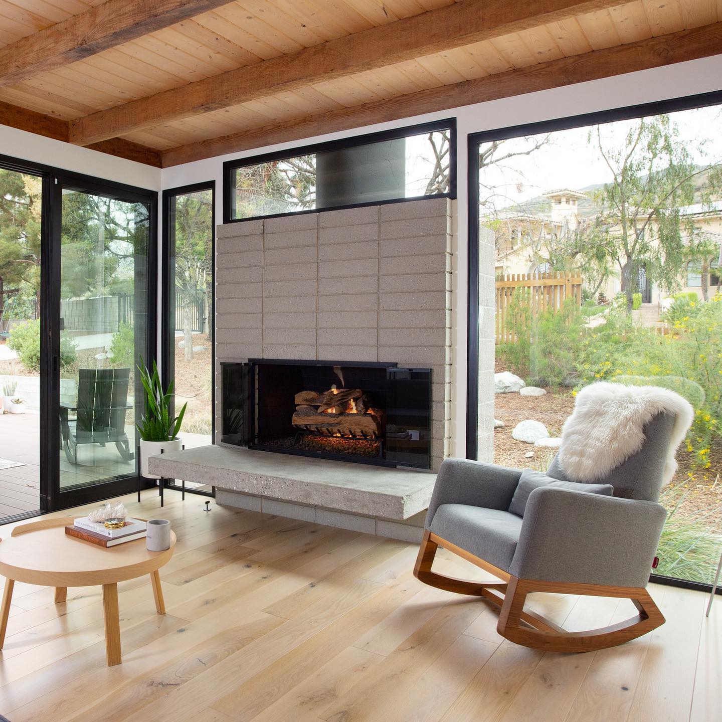 2. Mid-century Meets Mosaic: the Terrazzo Fireplace with Geometric Brass Inlay