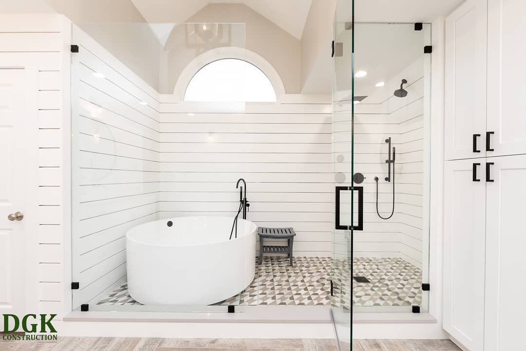 13. Shiplap Meets Seaside Serenity: Coastal Blue Accents and Circular Mirrors
