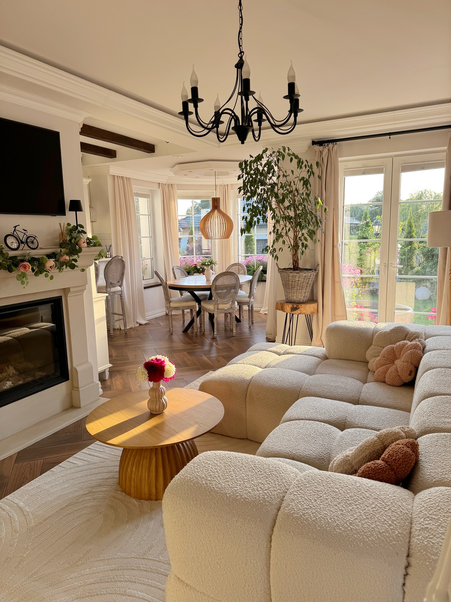 25. Velvet Emerald Sofa Meets Geometric Gold Sunburst: a Living Room Fusion