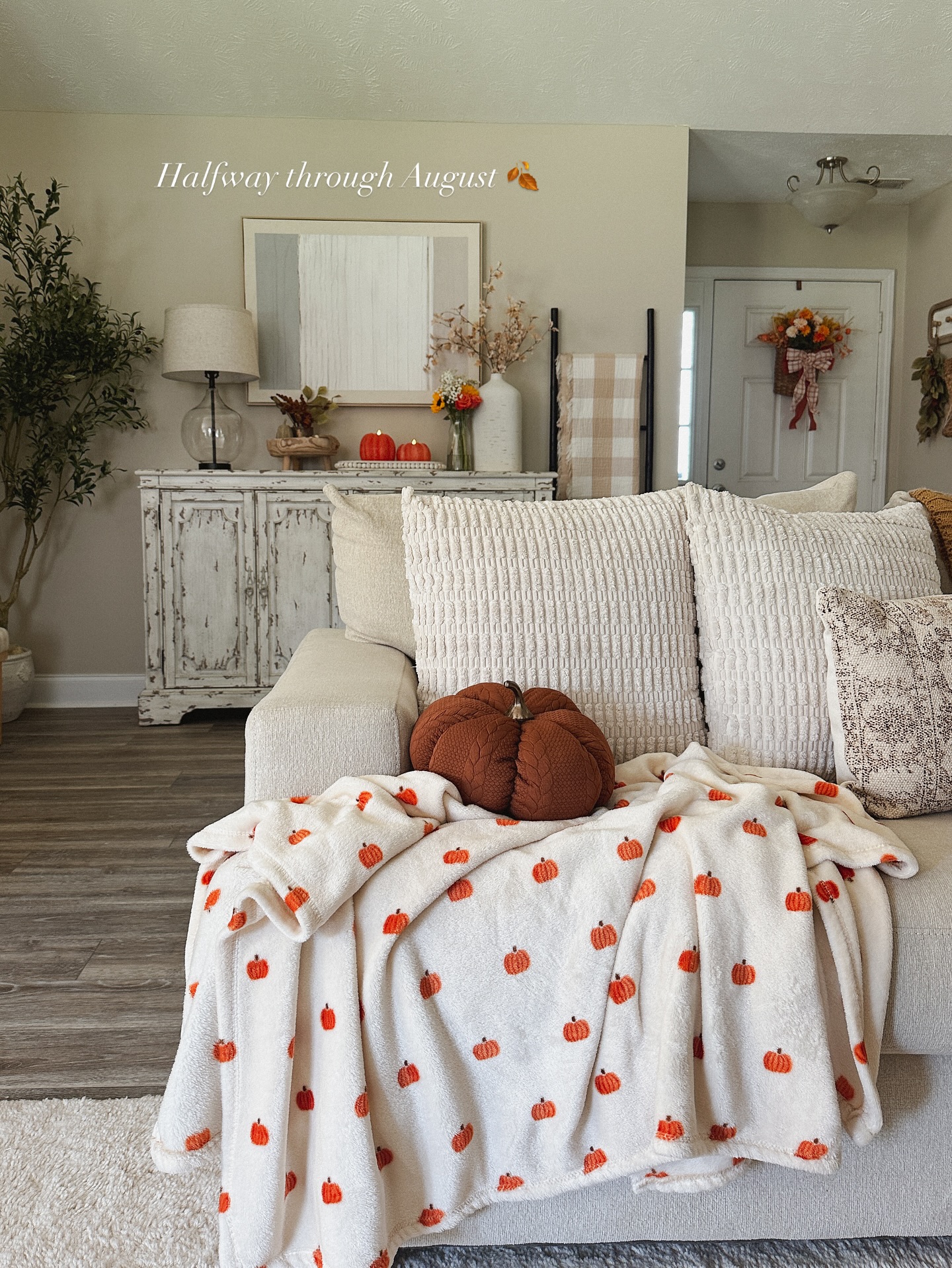 3. Cinnamon Stick Garland Woven Through Miniature Pumpkins and Acorns