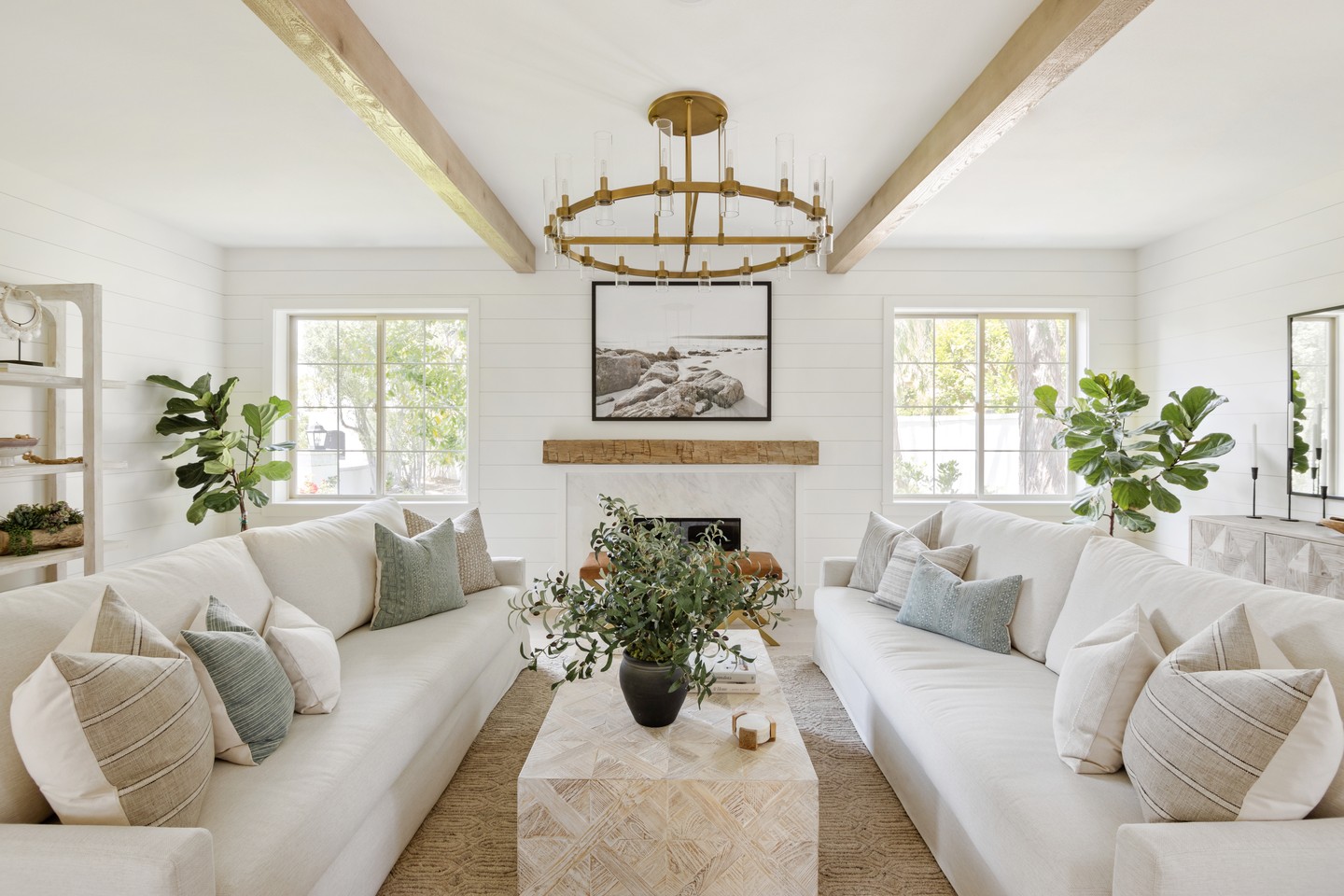 11. Coastal Serenity with a Woven Palm Ceiling Fan and Teal Accents