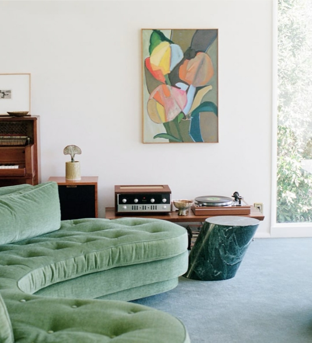 14. a Symphony Of Rustic Woods and Vintage Books Above the Couch
