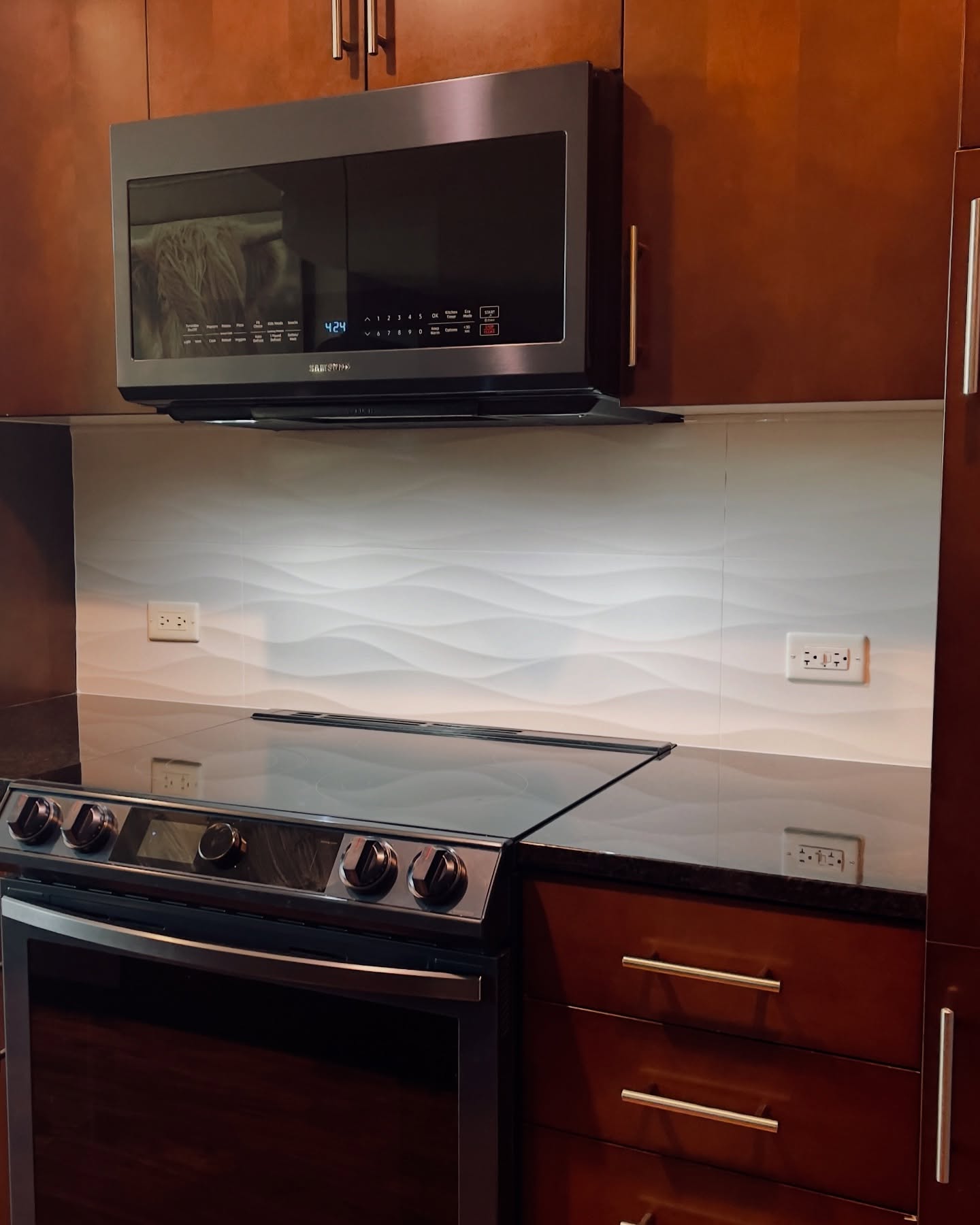 46. Vibrant Mosaic Of Blue and Green Glass Tiles with Copper Accents