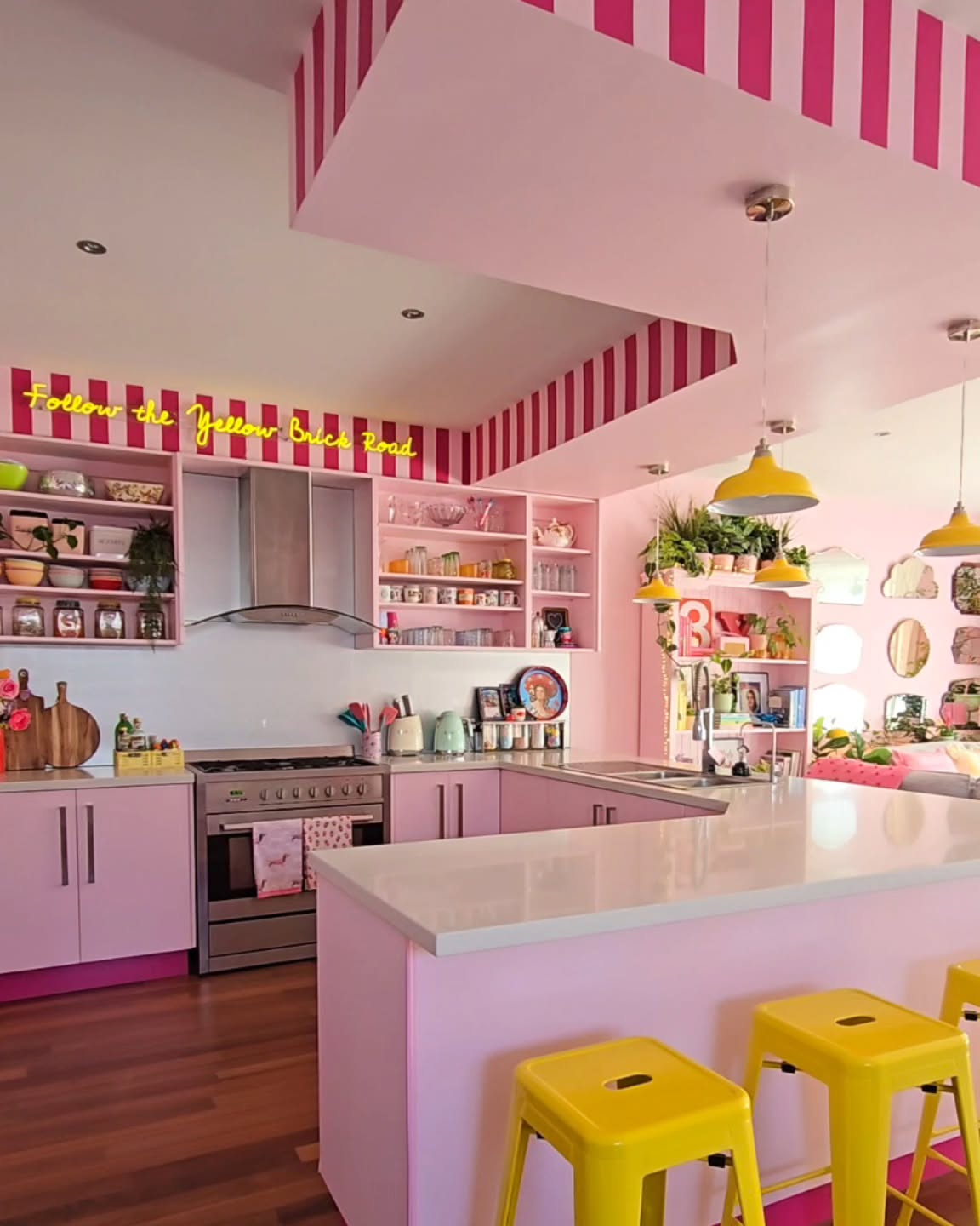 13. Fuchsia Flamingo Feathers and Copper Kettles: a Vibrant Pink Kitchen Ensemble