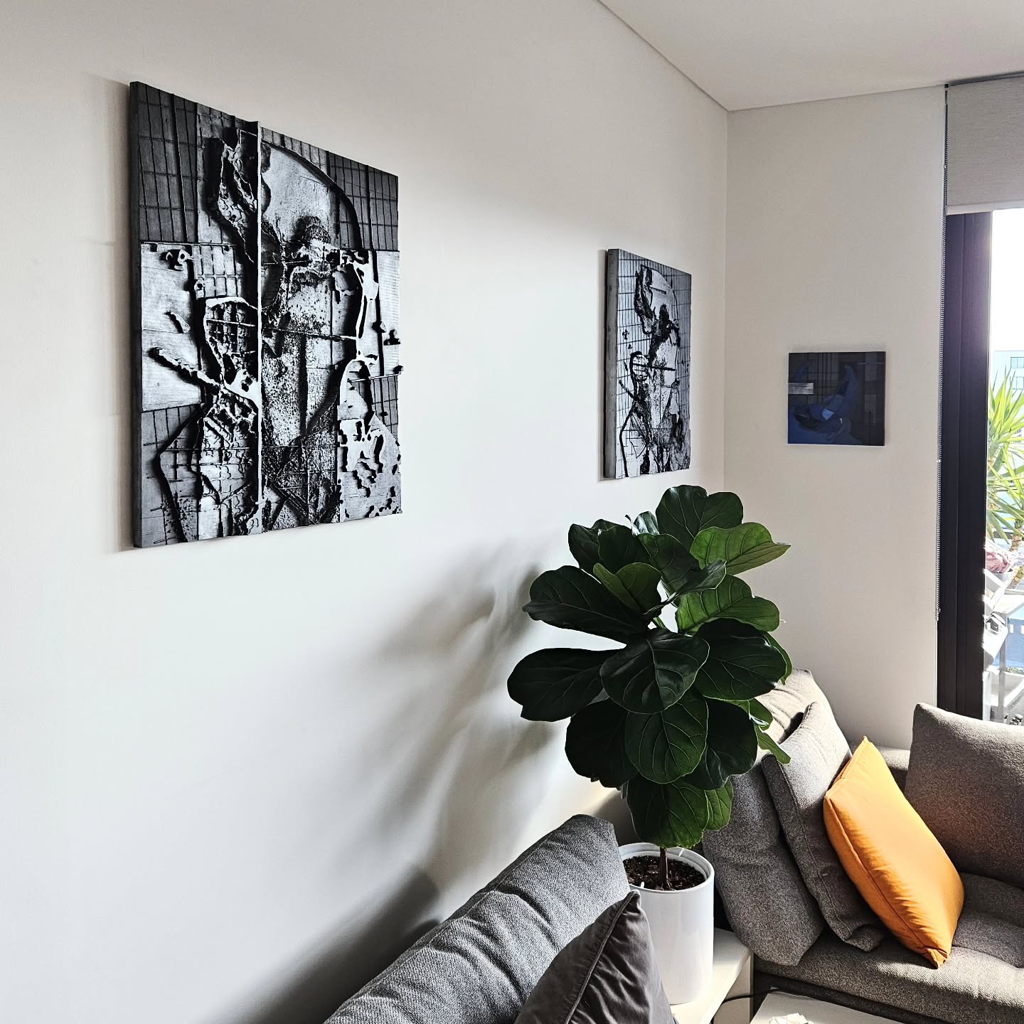 5. Indigo Waves and Golden Accents: a Modern Art Fusion Above the Couch