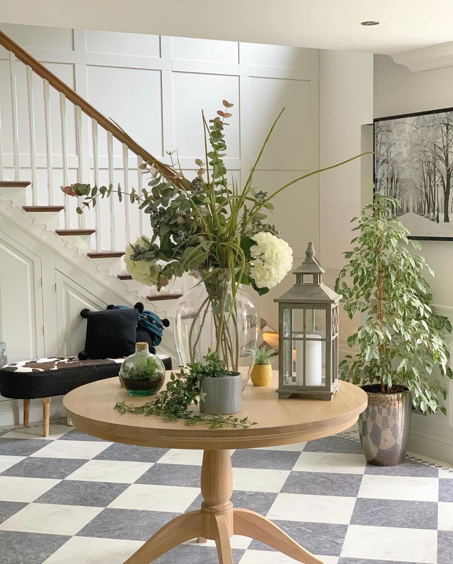 9. Velvet Curtains Frame a Sunlit Arched Alcove with a Vintage Bench