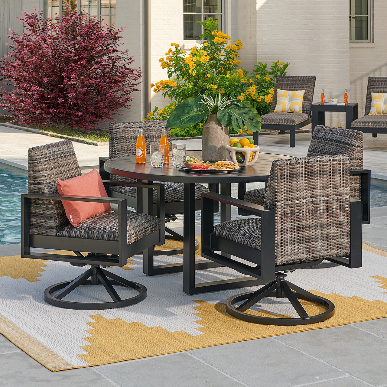 15. Wicker Waves and Teal Treasures: a Coastal-inspired Patio Setup