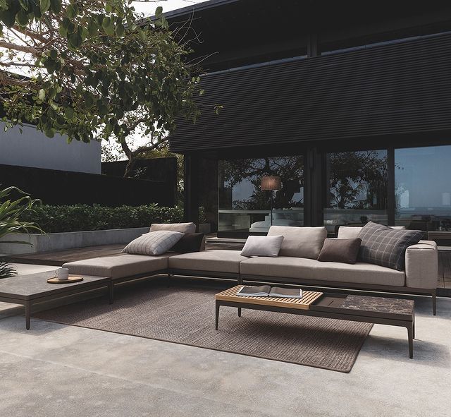 22. Wicker Waves and Mosaic Mirrors: a Coastal Patio Retreat