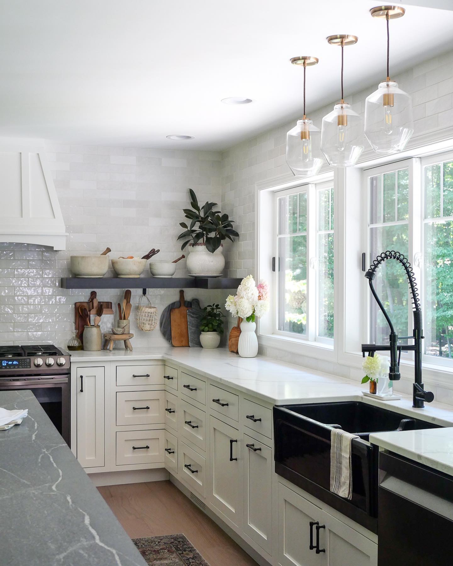 4. Tiles Of Twilight: Indigo and Plum Herringbone Backsplash with Metallic Accents