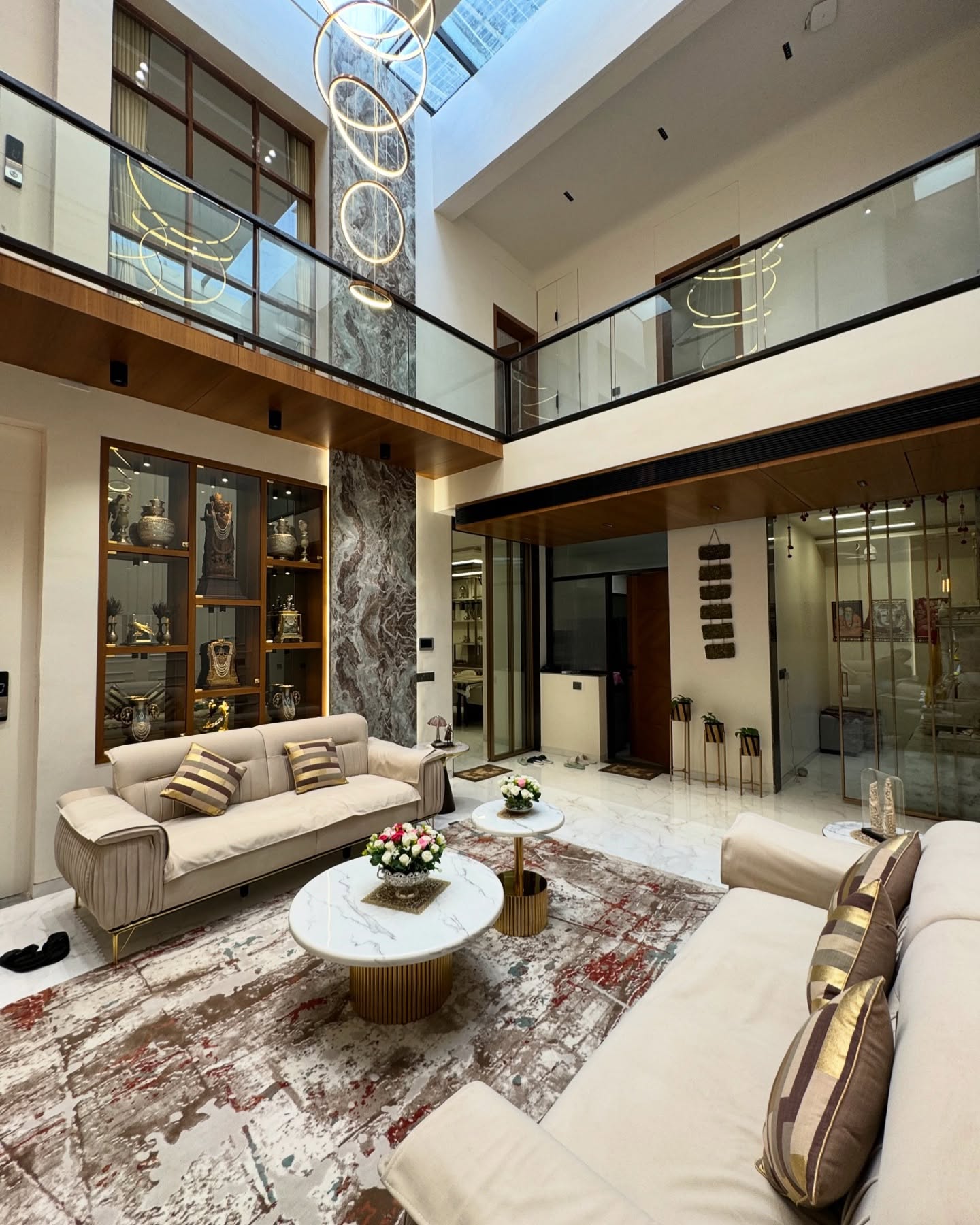 36. Cobalt Blue Accent Wall with Geometric Bookcase Living Room