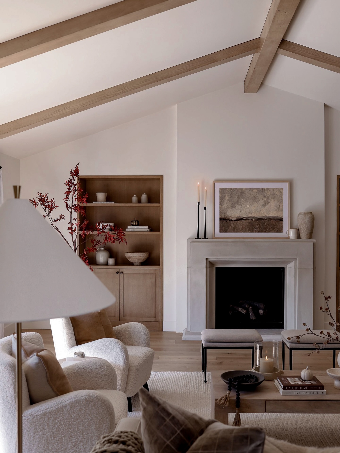 6. a Rustic Charm with a Trio Of Pumpkins and a Single Crimson Leaf