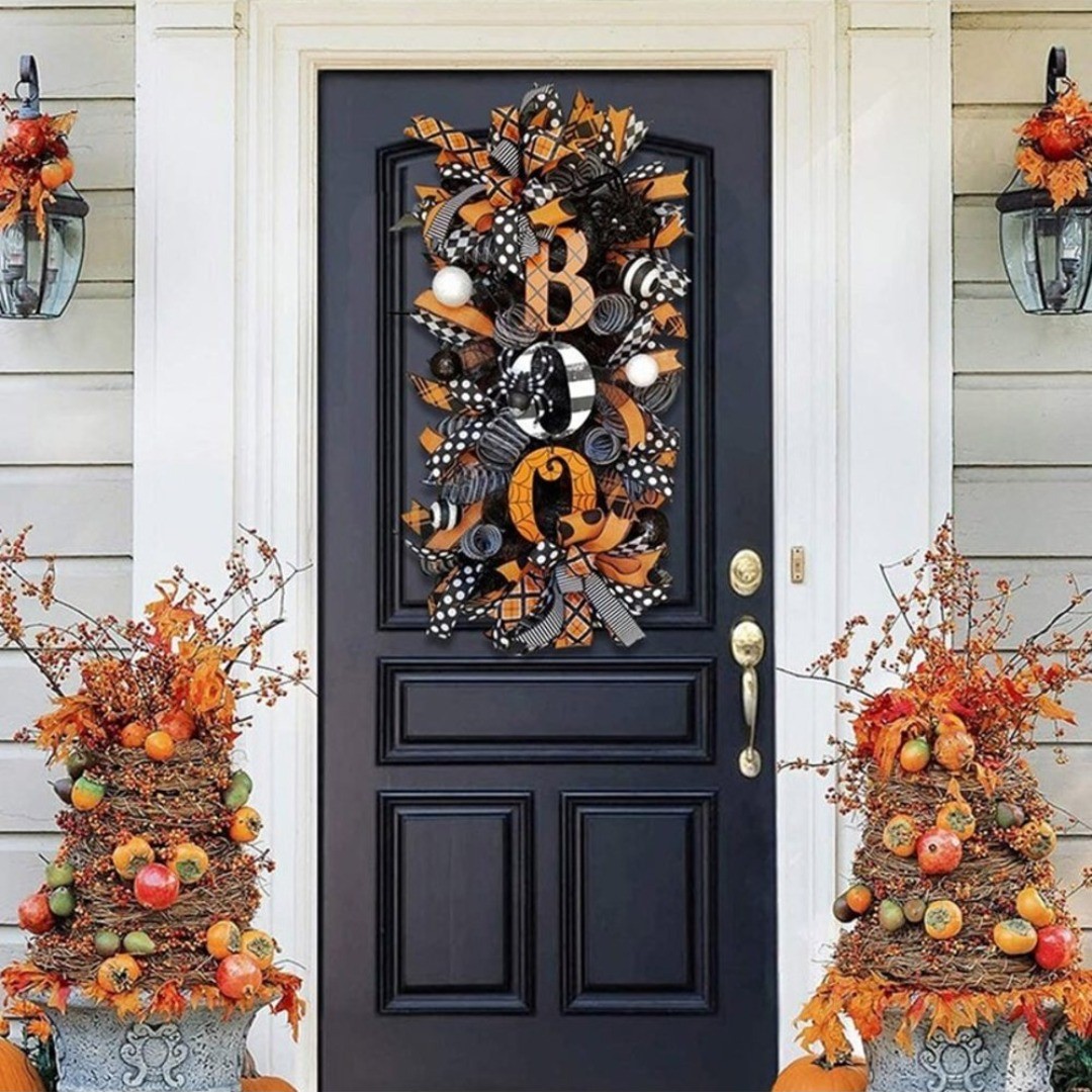 1. Spooky Silhouettes and Cobweb Canopy Over a Jack-o'-lantern Welcome Mat