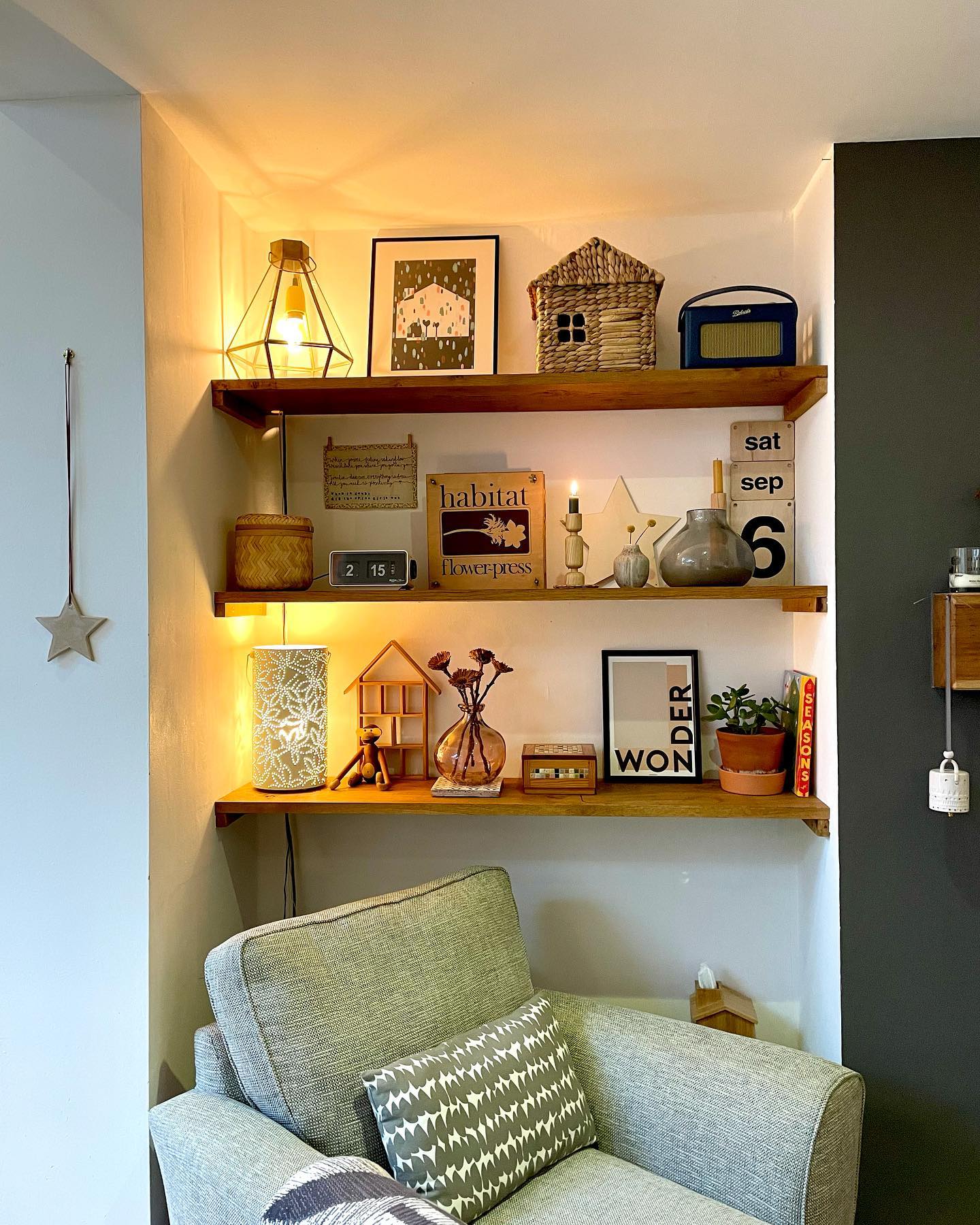 15. Floating Geometric Shelves with Curved Accents and Warm Lighting
