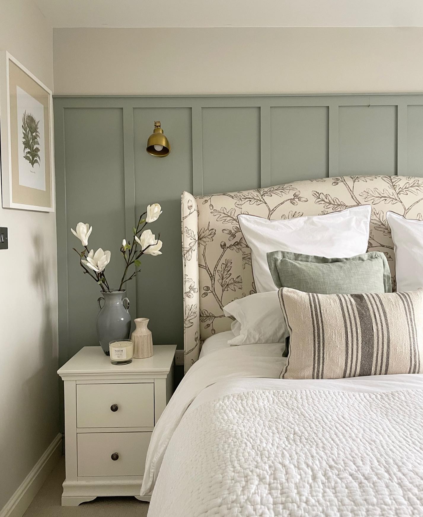 8. Soft Blush Accents on Crisp White Linens with Geometric Wall Shadows
