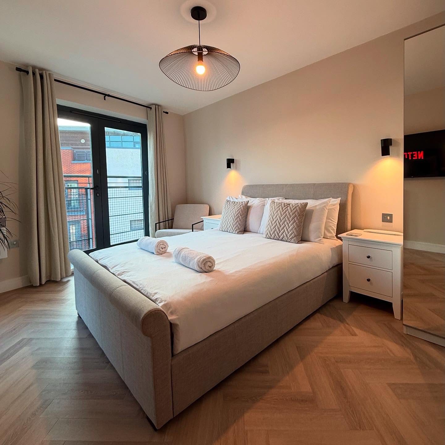 17. Moonlit Serenity: a Bedroom with a Canopy Bed and Luminous White Drapes