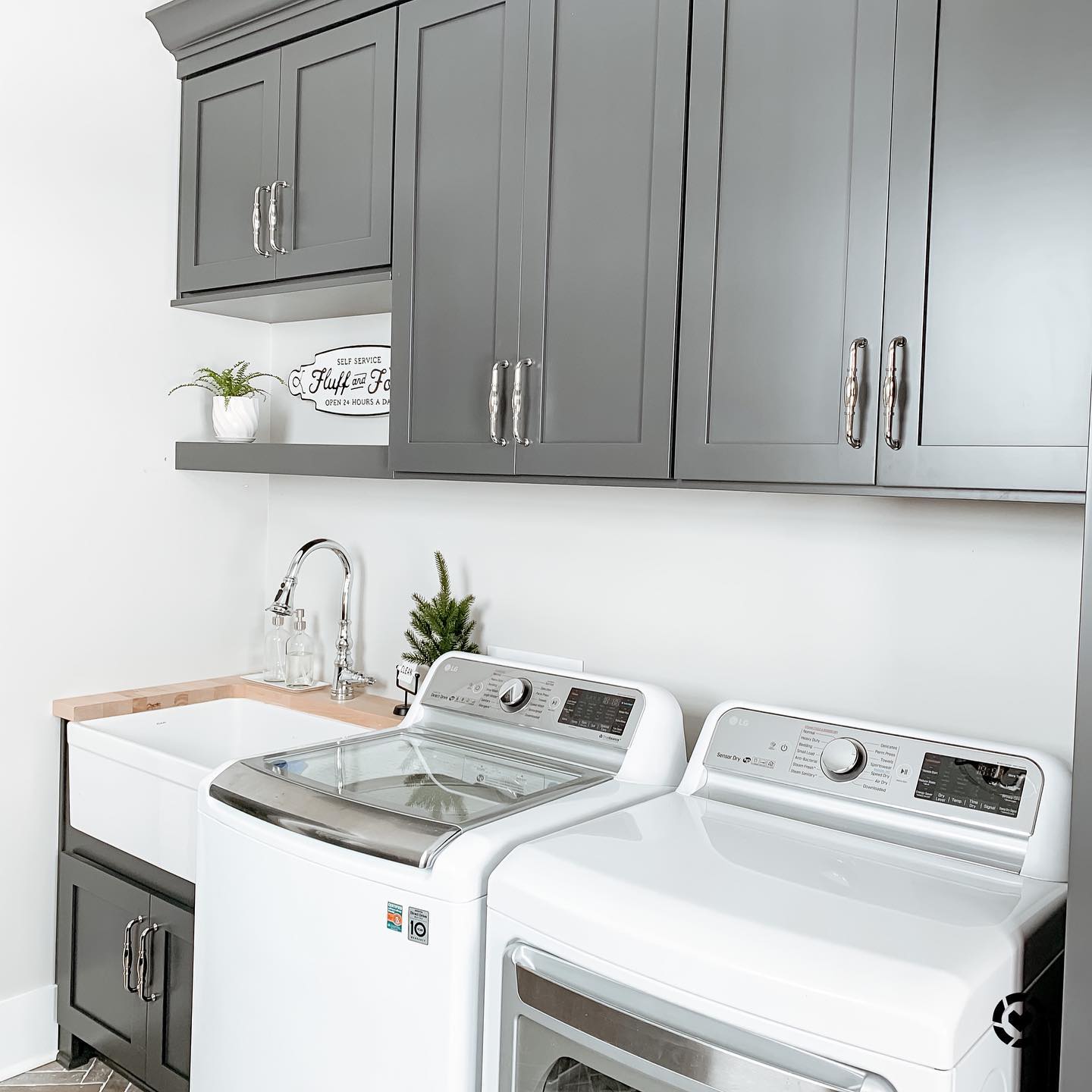 14. Crisp White Slatted Doors Meet Industrial Chic with Exposed Piping In Compact Laundry Setup