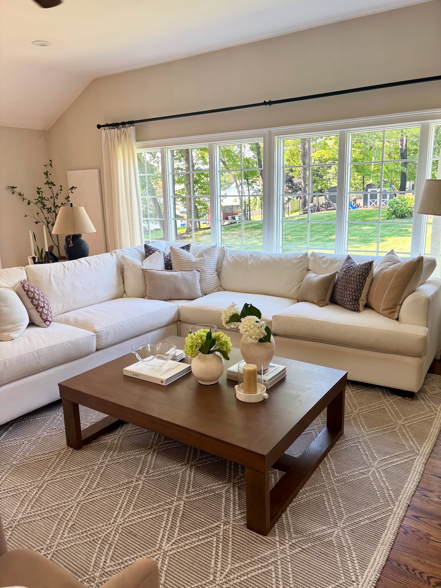 36. a Sunlit Canvas Of Serenity with Geometric Wall Art and a Plush Velvet Sofa
