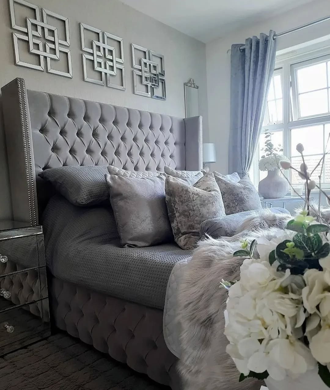 52. Silver Whisper Wallpaper and Velvet Drapes Create a Moonlit Haven