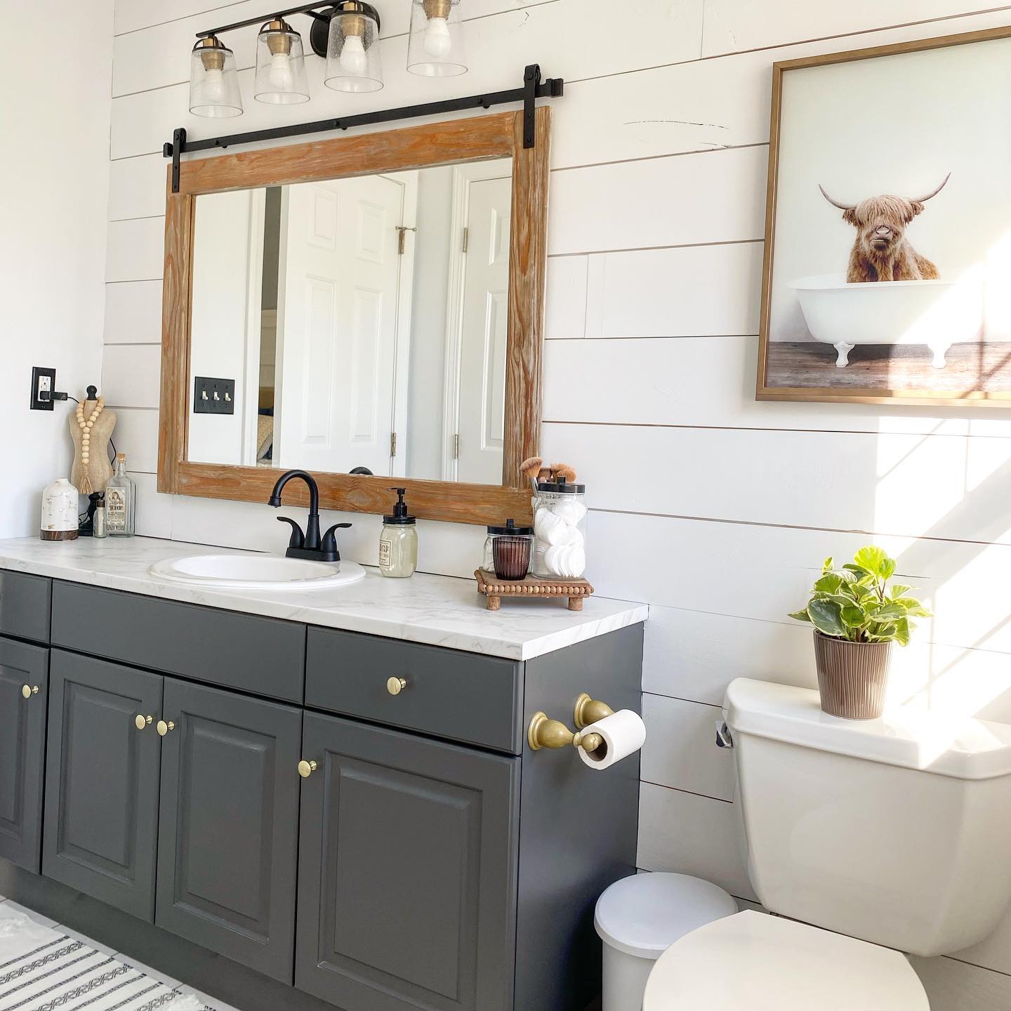 15. Shiplap Serenity: the Ballet Of Blue and White Tiles In a Compact Space